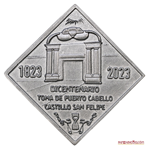 FICHA DE 20$ CONMEMORATIVA DEL BICENTENARIO DE LA TOMA DE PUERTO CABELLO POR NUMISUBASTAS